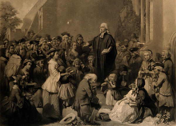 존 웨슬리(John Wesley, 1705 - 1791)는 영국 개신교계에서 감리교 운동을 시작한 인물로, 영국과 미국의 감리교 창시자다. 웨슬리의 사역은 19세기 성결 운동과 20세기 오순절 운동 및 기독교 사회복지 운동에 큰 영향을 끼쳤다. 사진은 군중 앞에서 옥외 설교를 하는 모습으로 당시 영국의 도시 노동자들에게 폭발적인 반응을 일으키면서 진정한 예배의 가치를 되새기게 만들었다. 출처 : 웰컴트러스트